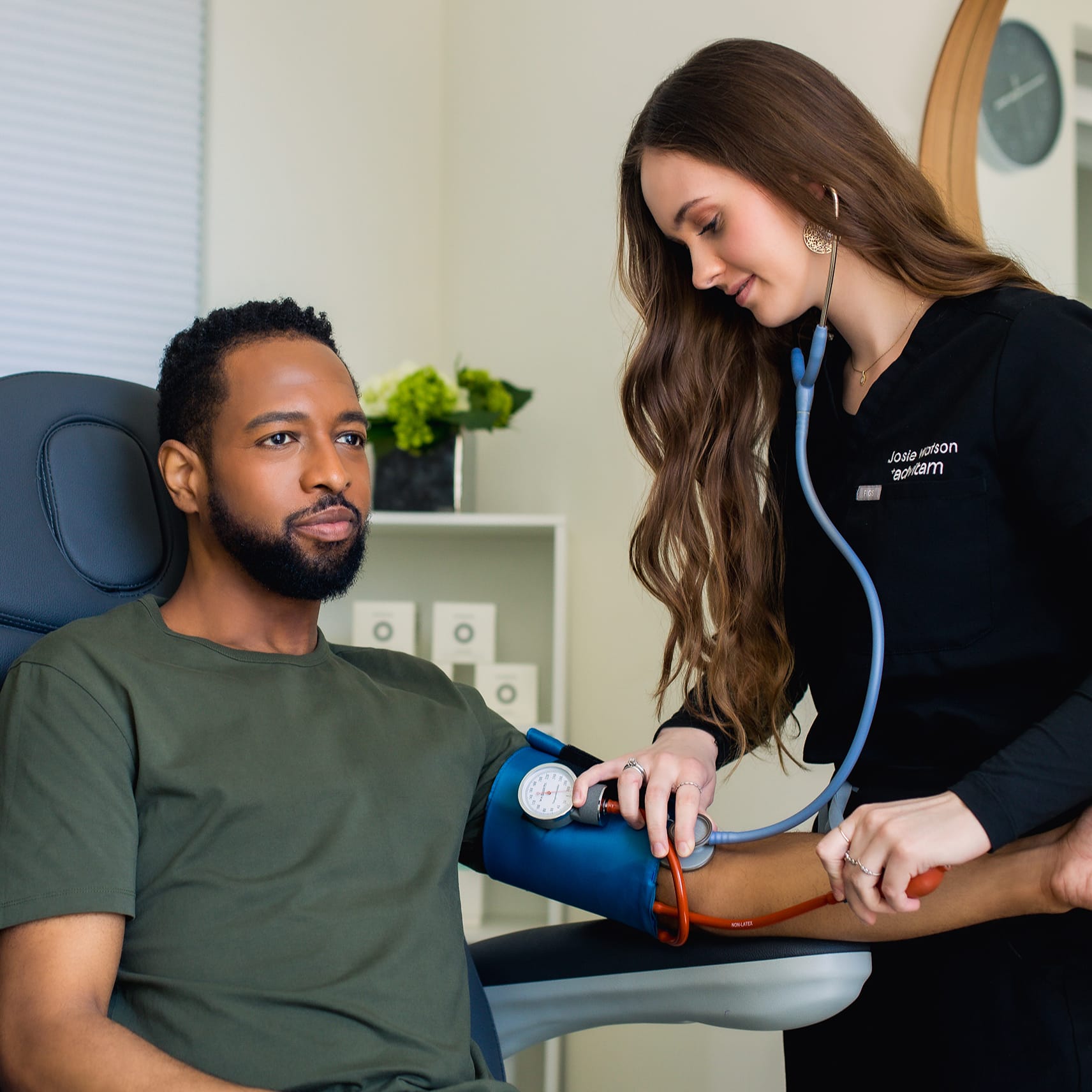 Nurse treating patient
