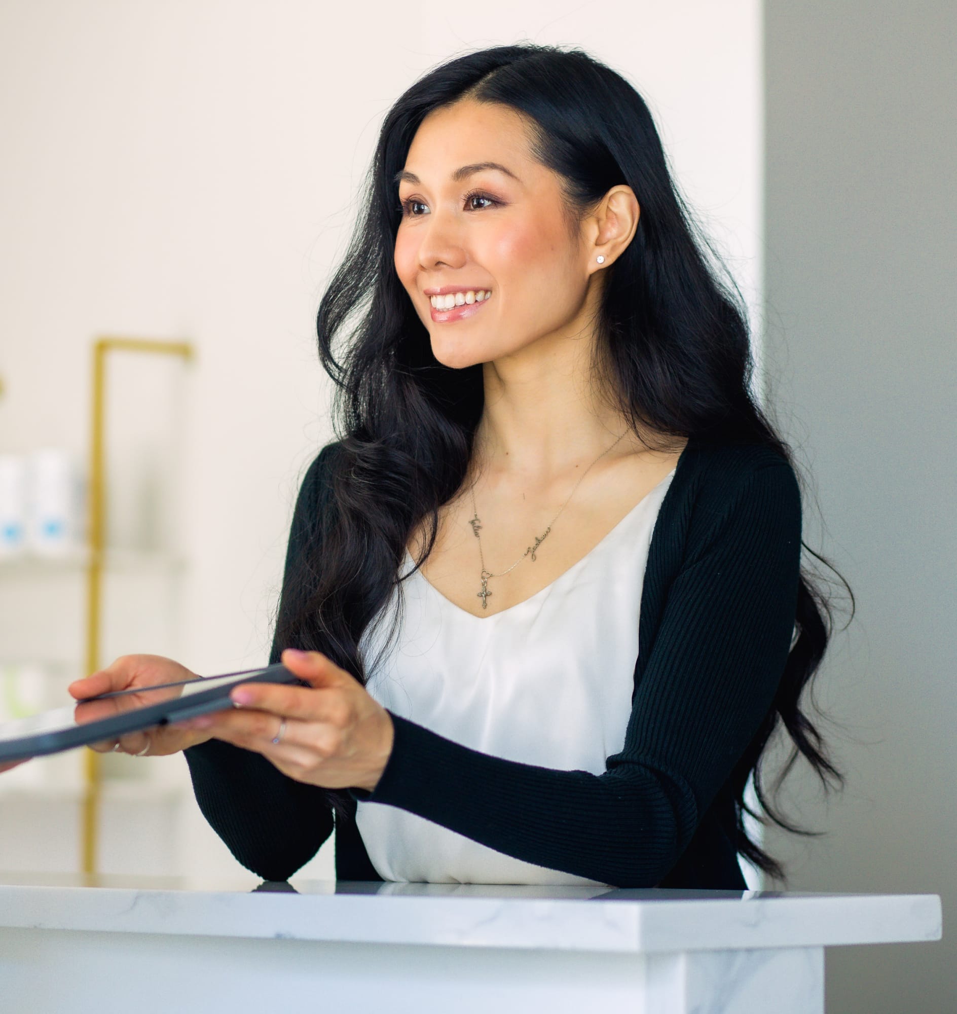 woman with long black wavy hair